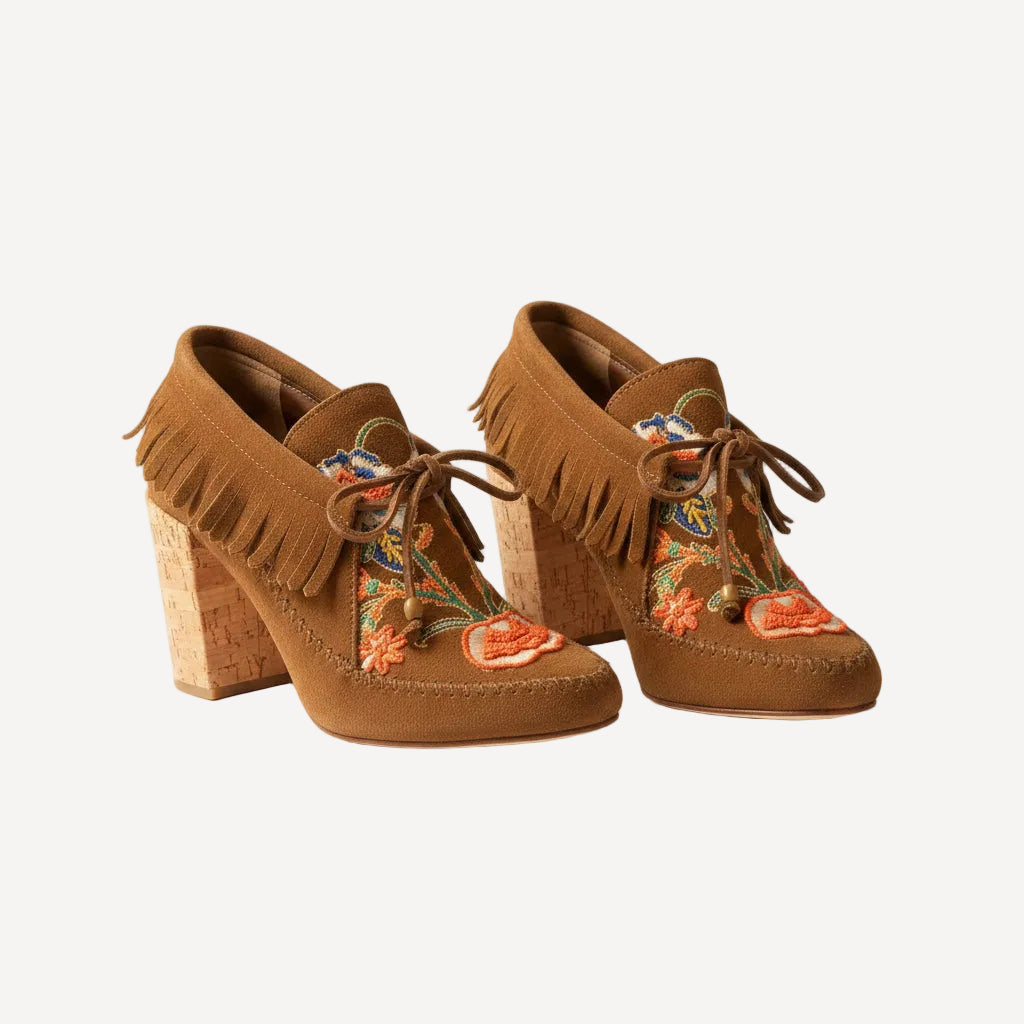 Bailey Grace Closet Concierge brown suede Tory Burch moccasin heels with floral embroidery, fringe, and cork block heels.