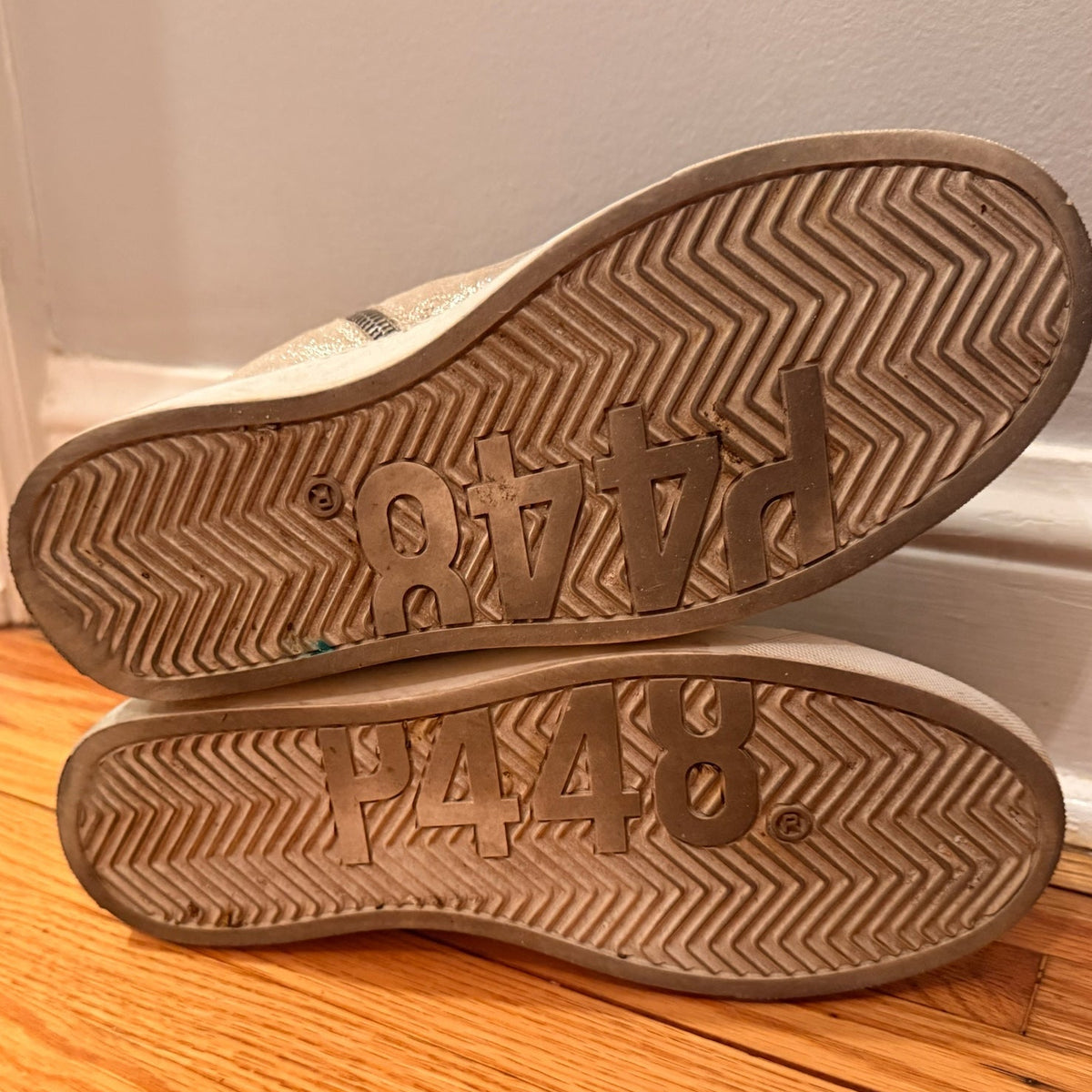 Bailey Grace Closet Concierge P448 high top sneakers showing the durable rubber soles with embossed logo branding
