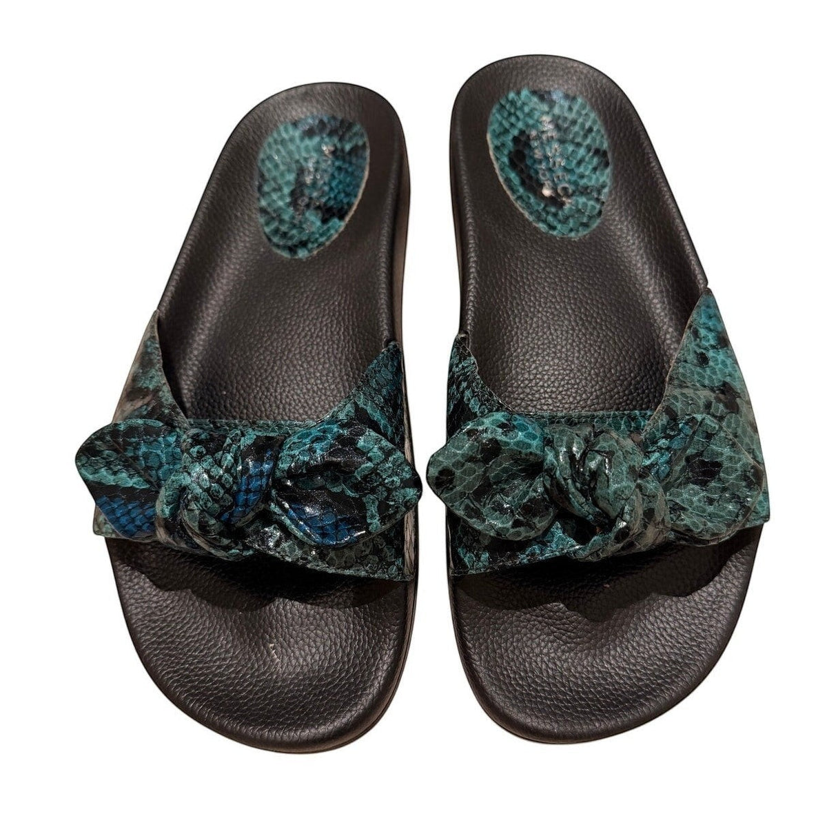 Bailey Grace Closet Concierge Messeca teal snake print slide sandals with double knotted bow detail and black footbed.