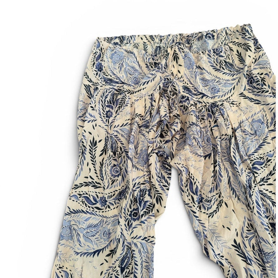Floral patterned pants on a white background